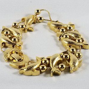 Vintage 3D dolphin gold tone 7" bracelet
